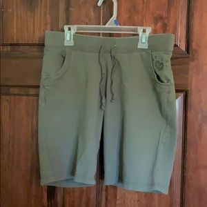 Justice army green athletic shorts size 16